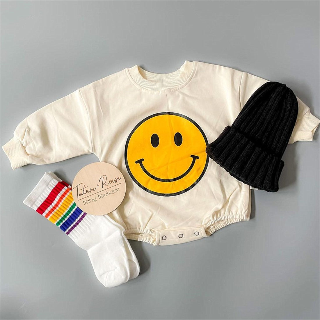 Vrolijke baby-smiley romper