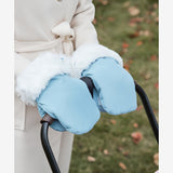 Image of blue gloves with thick fur lining and windproof exterior for warmth in cold weather