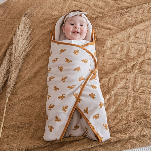 Vintage pattern Image of a cozy and secure newborn baby swaddle sack designed for infant sleep, suitable for 0-3 months with TOG 0.5 rating